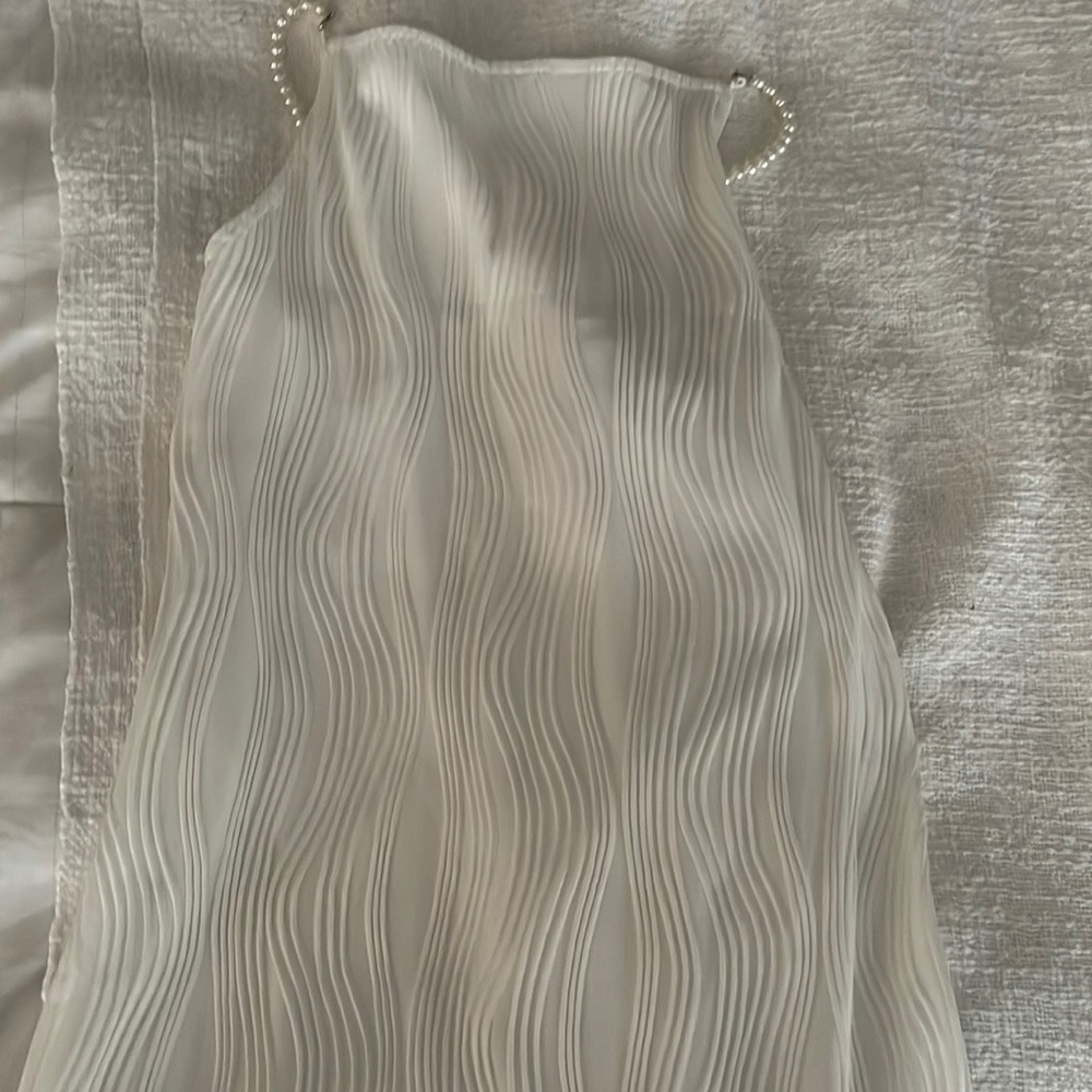 A white sleek dress from Rihoas